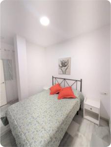 Ένα ή περισσότερα κρεβάτια σε δωμάτιο στο Puerto Luxury Centro +1 φωτογραφίες