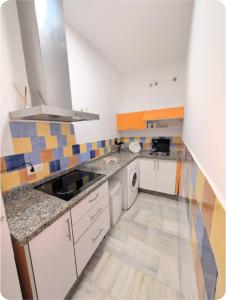 Η κουζίνα ή μικρή κουζίνα στο Puerto Luxury Centro