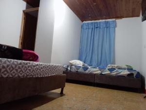 Postel nebo postele na pokoji v ubytování Finca hotel el paraiso