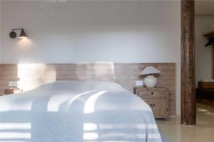 Shaxi Ancient Town Shiran Mountain Homestay客房内的一张或多张床位