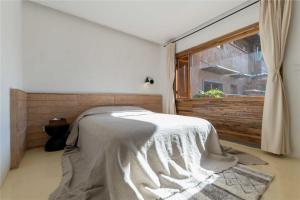 Shaxi Ancient Town Shiran Mountain Homestay客房内的一张或多张床位
