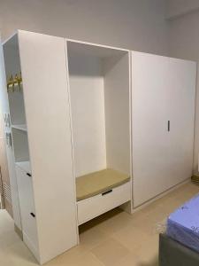 Postel nebo postele na pokoji v ubytování G108 Cheer Residences