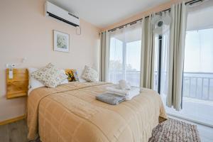 Voodi või voodid majutusasutuse Nosara Hideaway 2 - BREAKFAST INCLUDED & Mountain View Cabins toas