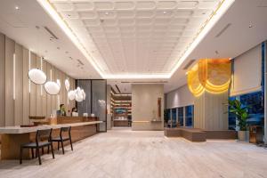 Fotografija u galeriji objekta World Hotel Jinan Bayi Interchange Provincial Sports Center Branch u gradu Đinan
