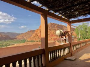 a balcony with a view of the mountains at Kasbah Alami in Kalaat MGouna