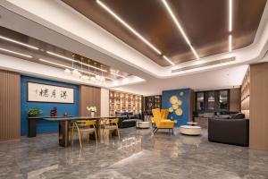 沃德酒店(济南凤鸣路鲍山地铁站店)的休息区