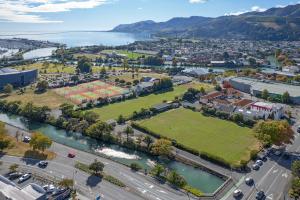 an aerial view of a city with a river at Havenview City Apartment in Nelson