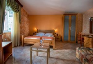 Postel nebo postele na pokoji v ubytování Hotel Rendez Vous