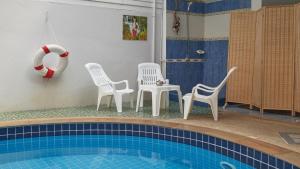 Bazén v ubytování Lime Hotel nebo v jeho okolí