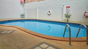 Bazén v ubytování Lime Hotel nebo v jeho okolí