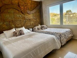 Voodi või voodid majutusasutuse --CHALET EN ALICANTE-- Piscina Privada toas