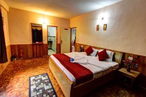 Letto o letti in una camera di The Ambience Resort, Nainital - A Hidden Gem Away From City Hustle