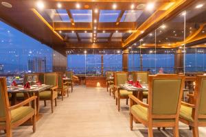 Restoran või mõni muu söögikoht majutusasutuses Aarya Hotel and Spa