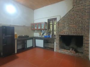 Kuchyň nebo kuchyňský kout v ubytování Innawood Vegan Homestay