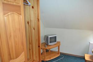 TV a/nebo společenská místnost v ubytování Motelis Aka