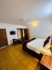 Letto o letti in una camera di The Ambience Resort, Nainital - A Hidden Gem Away From City Hustle