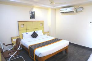 Postel nebo postele na pokoji v ubytování Hotel Way Inn Grand