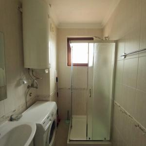 Koupelna v ubytování Olymp SkyView Apartment