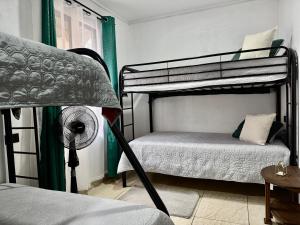 Postel nebo postele na pokoji v ubytování Brisa Amatista - Casa completa y centrica en San Ramón #1