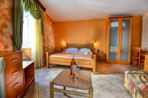 Postel nebo postele na pokoji v ubytování Hotel Rendez Vous