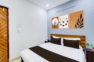 Postel nebo postele na pokoji v ubytování Super Townhouse Nallagandla Lingampally + 28 fotografií