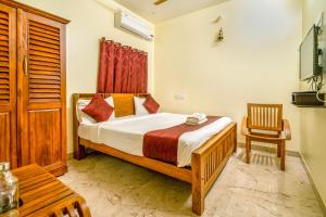 Postel nebo postele na pokoji v ubytování Bairava Bliss Inn - Rameswaram