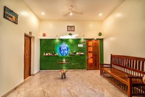 Posezení v ubytování Bairava Bliss Inn - Rameswaram