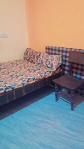 Et opholdsområde på Lakshman Guest House Varanasi + 9 billeder