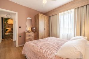 Posteľ alebo postele v izbe v ubytovaní Paradisio Baby & Kinder Hotel