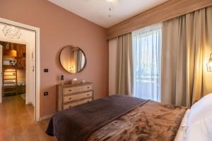 Posteľ alebo postele v izbe v ubytovaní Paradisio Baby & Kinder Hotel