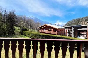 a view of a house from a balcony at Résidence Les Houches Villages - Houches Village B23 MAE-6424 in Les Houches