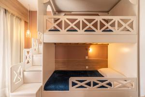 Posteľ alebo postele v izbe v ubytovaní Paradisio Baby & Kinder Hotel