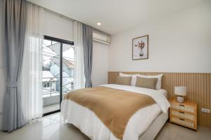 Ένα ή περισσότερα κρεβάτια σε δωμάτιο στο Digital Nomad 5BR House Fast Wi-Fi In Nimmanhemin