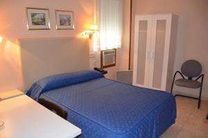 Ein Bett oder Betten in einem Zimmer der Unterkunft Hotel Legazpi