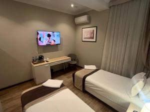 TV a/nebo společenská místnost v ubytování SATO HOTEL TASHKENT