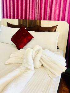 Katil atau katil-katil dalam bilik di Hotel Mina's dreams