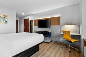 Postel nebo postele na pokoji v ubytování Microtel Inn & Suites by Wyndham Tulsa - Catoosa Route 66