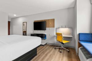 Postel nebo postele na pokoji v ubytování Microtel Inn & Suites by Wyndham Tulsa - Catoosa Route 66