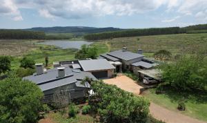 an aerial view of a house in a field at 10onBrightside-Exp the epitome of country living in Nelspruit