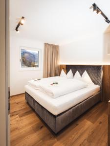 Ένα ή περισσότερα κρεβάτια σε δωμάτιο στο Paradeis Apartments A17