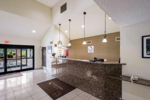 a large lobby with a bar in a building at Sleep Inn Statesville I-40 in Statesville