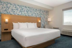 Postel nebo postele na pokoji v ubytování Quality Inn & Suites Prescott