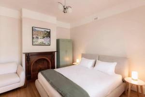 Ένα ή περισσότερα κρεβάτια σε δωμάτιο στο 'Sobrina=' - A home away from home in Sandy Bay