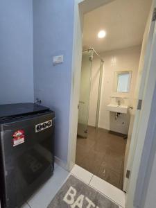 a bathroom with a sink and a shower at Comfy Studio Neo Damansara Ikea Ikano 2Pax1CP in Petaling Jaya