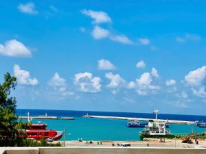 a view of a harbor with boats in the water at Jayden Hotel - Phú Quý in Îlot du Sud