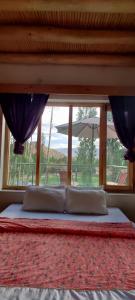 Postel nebo postele na pokoji v ubytování Morning Sky Homestay