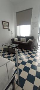 Część wypoczynkowa w obiekcie Casas y Patios de Sevilla