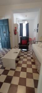 Część wypoczynkowa w obiekcie Casas y Patios de Sevilla