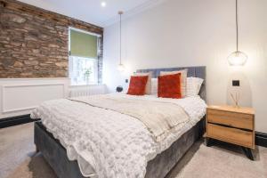 Voodi või voodid majutusasutuse Grosvenor Cottage - Kendal Lake District, Parking toas