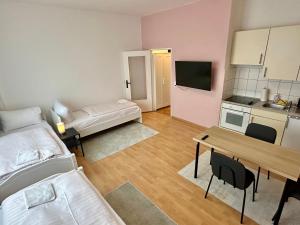 Η κουζίνα ή μικρή κουζίνα στο Hevals Budget & Beyond Apartments +35 φωτογραφίες